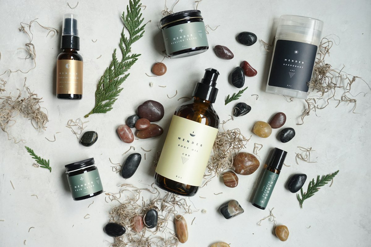 Beauty and skincare products arranged in warm, earthy tones